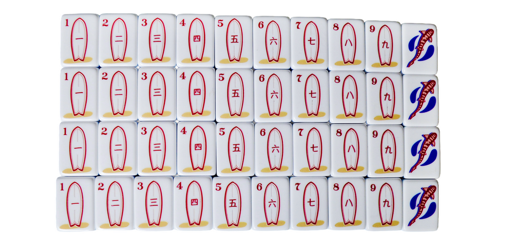 The La Jolla Tiles coastal mahjong set featuring surfboards as craks; surfboards as cracks. 